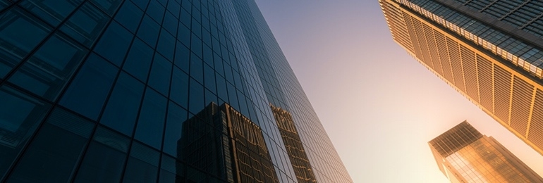 Ground up view of skyscrapers at dusk